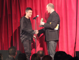 Richard Russell collects the award, on behalf of Damon Alburn, from Martin Warr of Synthax Audio UK