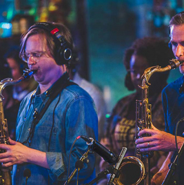 Snarky Puppy horn players with Lauten Audio Microphones