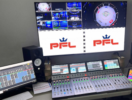 Calrec Type R console in front of large screen monitoring for Professional Fighters League