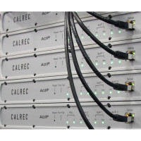 Stack of Calrec H2-IP Gateway interfaces with connected ethernet cables